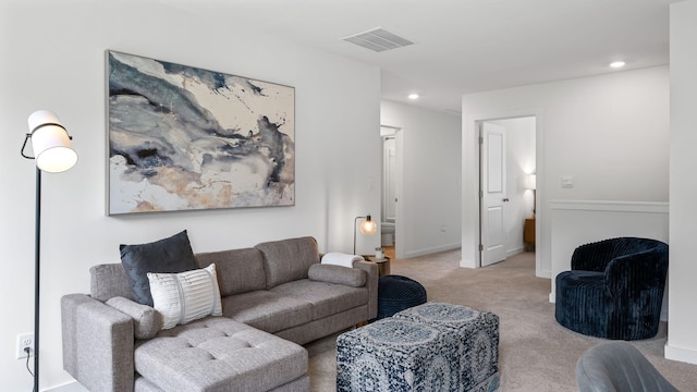 living room with light carpet, baseboards, visible vents, and recessed lighting