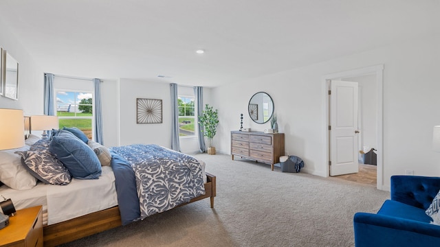 bedroom with carpet floors, recessed lighting, and baseboards