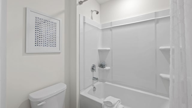 full bath with toilet and shower / bath combo