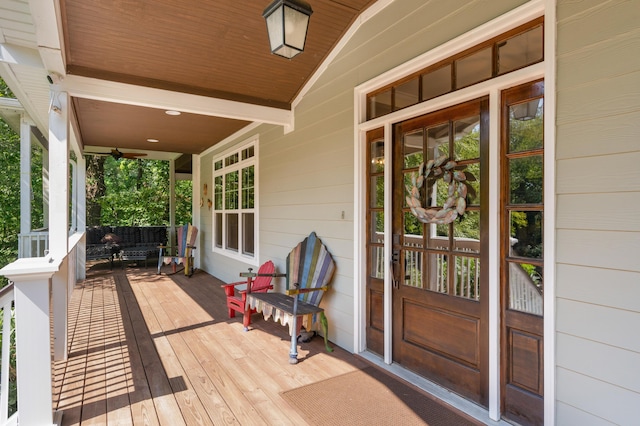 entrance to property with a porch