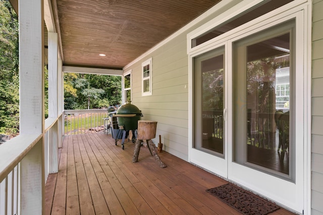 wooden deck featuring a porch