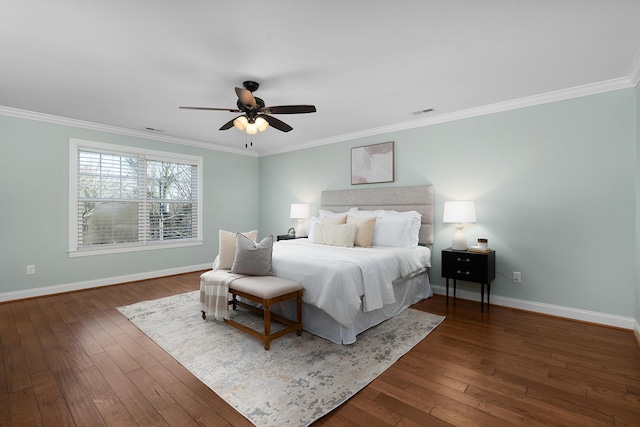 bedroom with ceiling fan, baseboards, hardwood / wood-style floors, and ornamental molding