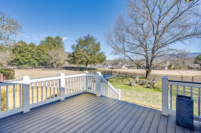 deck with a yard and fence private yard