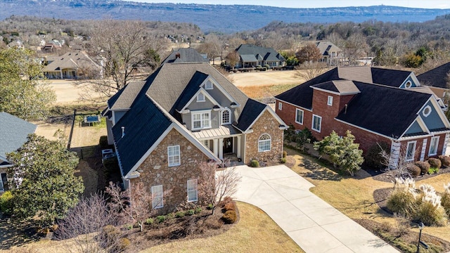 bird's eye view featuring a residential view and a mountain view