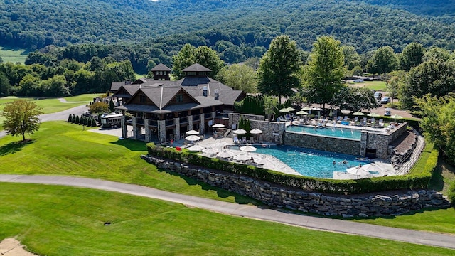 aerial view with a wooded view