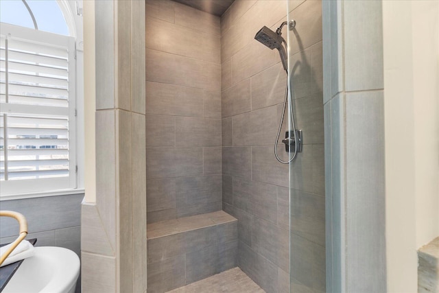 bathroom with a stall shower