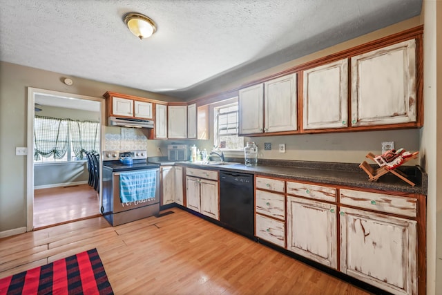 kitchen with black dishwasher, electric range, light wood-type flooring, and under cabinet range hood