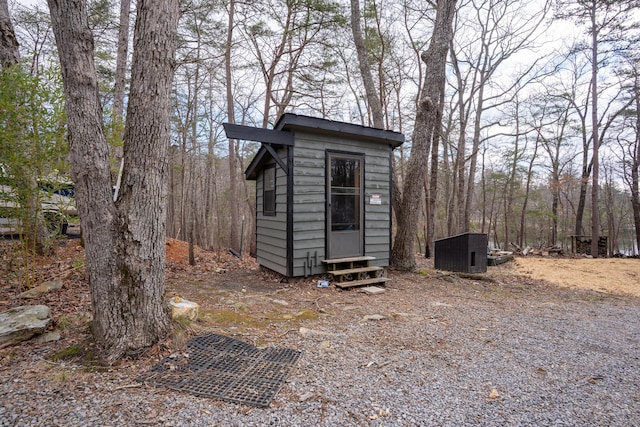 view of outbuilding with an outbuilding, central AC unit, and entry steps