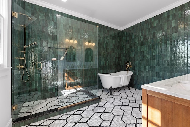 full bathroom with ornamental molding, tile walls, a freestanding tub, and a shower stall