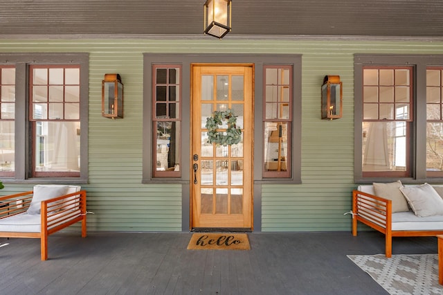 entrance to property with a porch