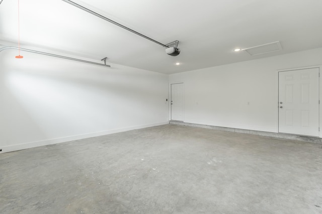 4659 Heiskell Dr, Chattanooga, TN 37416 - garage featuring recessed lighting, a garage door opener, and baseboards