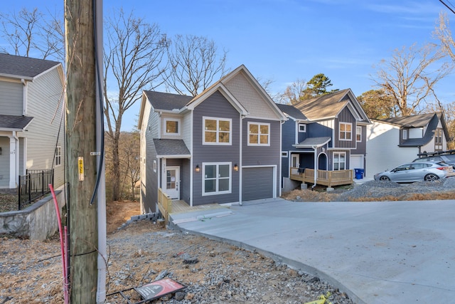 view of front of home featuring a garage and concrete driveway