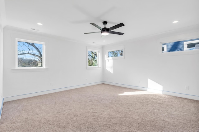 carpeted spare room with baseboards, visible vents, a ceiling fan, and recessed lighting