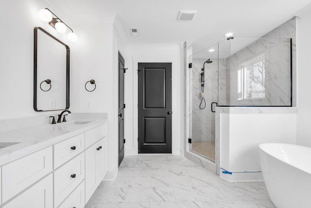 bathroom featuring marble finish floor, a sink, and a marble finish shower