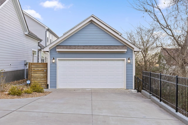 garage with fence