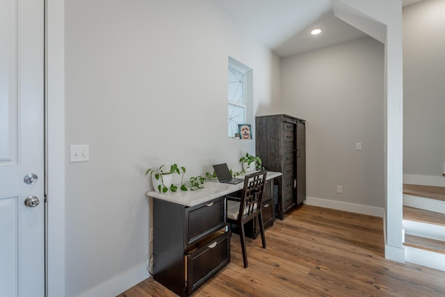 office space featuring recessed lighting, wood finished floors, and baseboards