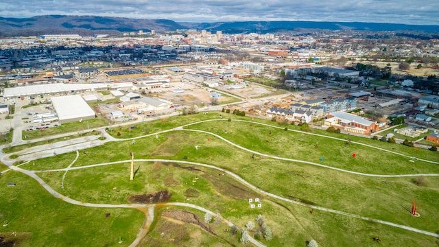 drone / aerial view featuring a city view