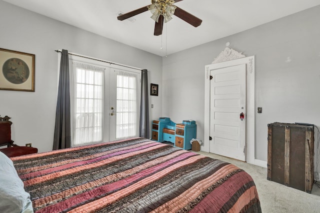 bedroom featuring french doors, light colored carpet, and ceiling fan