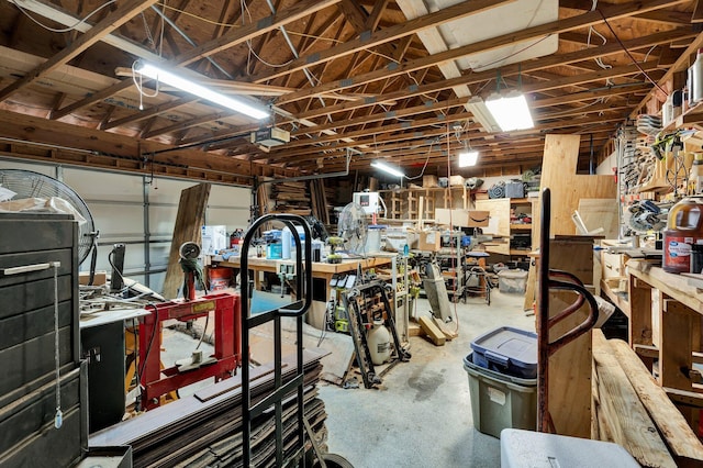 garage with a workshop area