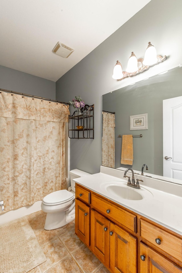 full bath featuring toilet, visible vents, and vanity