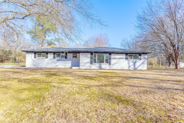 ranch-style house featuring a front yard and crawl space