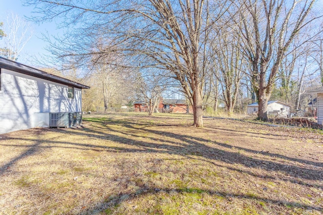 view of yard featuring central AC unit