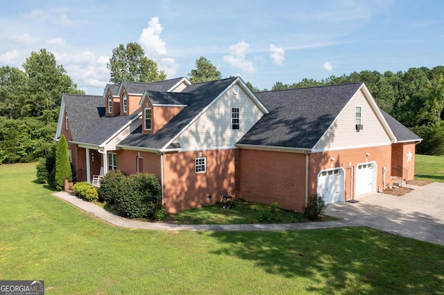 view of property exterior with driveway, brick siding, a garage, and a yard