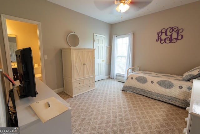 bedroom featuring baseboards, ceiling fan, and light colored carpet