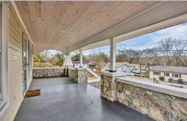 view of patio featuring a residential view and covered porch