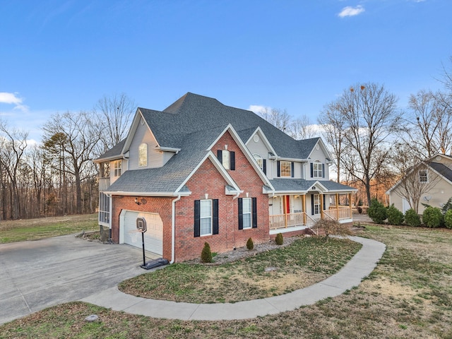 view of front of house featuring a porch, brick siding, concrete driveway, roof with shingles, and a front lawn