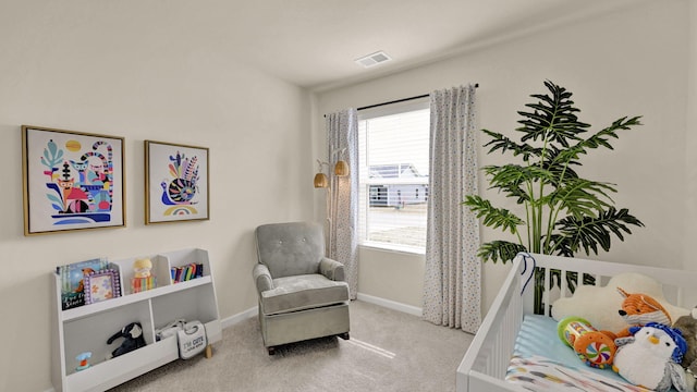 bedroom with carpet, visible vents, and baseboards