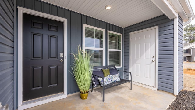 property entrance featuring covered porch