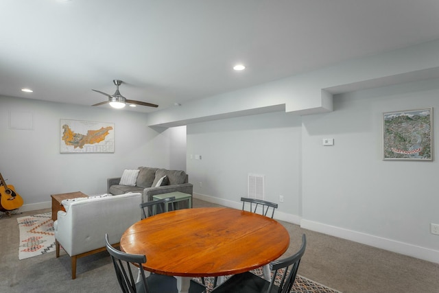 dining space featuring carpet floors, ceiling fan, baseboards, and recessed lighting