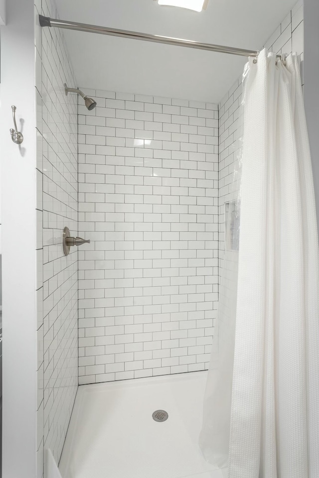 bathroom featuring a stall shower