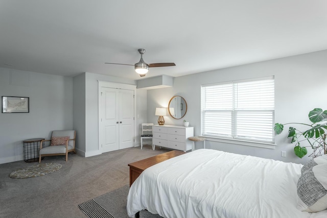 bedroom featuring carpet floors, a closet, ceiling fan, and baseboards