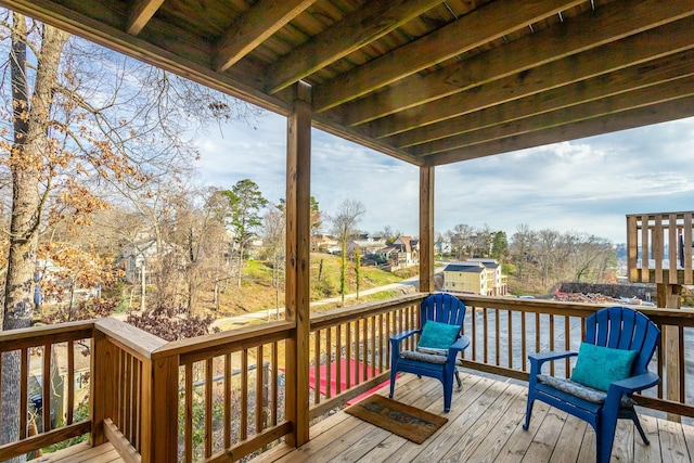 wooden deck with an outdoor structure