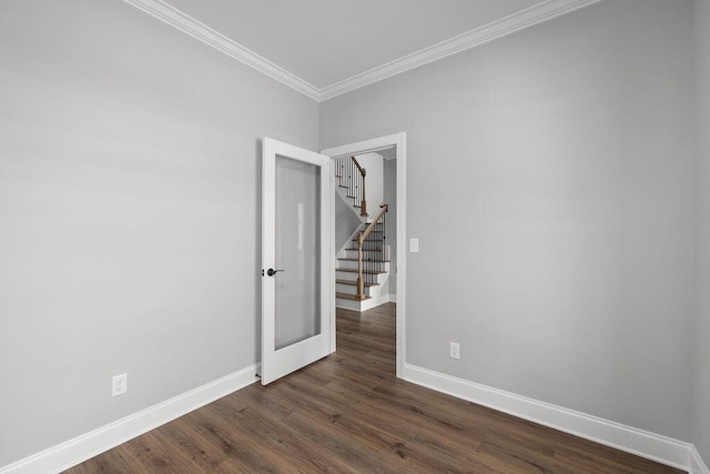 9676 Mayfly Rd # 10, Ooltewah, TN 37363 - empty room featuring crown molding, dark wood-style floors, and stairs