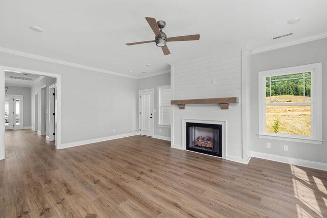 9676 Mayfly Rd # 10, Ooltewah, TN 37363 - unfurnished living room with ceiling fan, wood finished floors, a fireplace, and ornamental molding