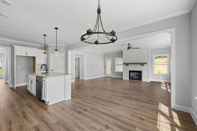 9676 Mayfly Rd # 10, Ooltewah, TN 37363 - kitchen featuring ceiling fan, dishwasher, a chandelier, a fireplace, and white cabinetry