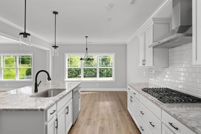 9676 Mayfly Rd # 10, Ooltewah, TN 37363 - kitchen with wall chimney exhaust hood, appliances with stainless steel finishes, decorative backsplash, white cabinetry, and light wood-style floors