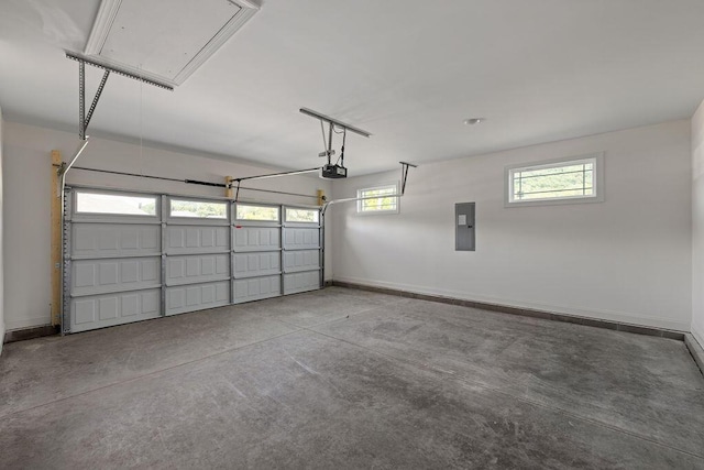 9676 Mayfly Rd # 10, Ooltewah, TN 37363 - garage featuring electric panel and a garage door opener