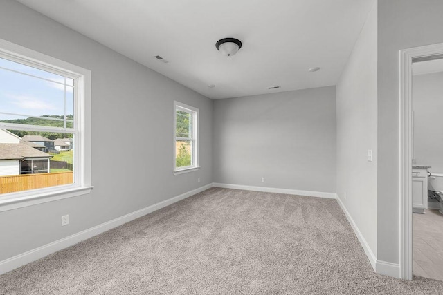 9676 Mayfly Rd # 10, Ooltewah, TN 37363 - unfurnished room with light colored carpet