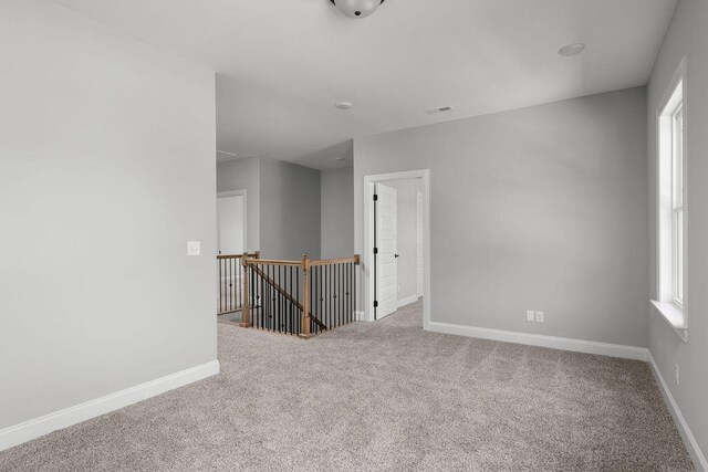 9676 Mayfly Rd # 10, Ooltewah, TN 37363 - carpeted empty room featuring baseboards