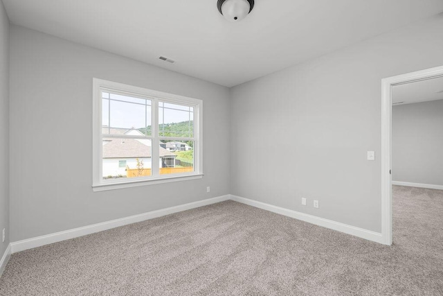 9676 Mayfly Rd # 10, Ooltewah, TN 37363 - spare room with carpet and baseboards