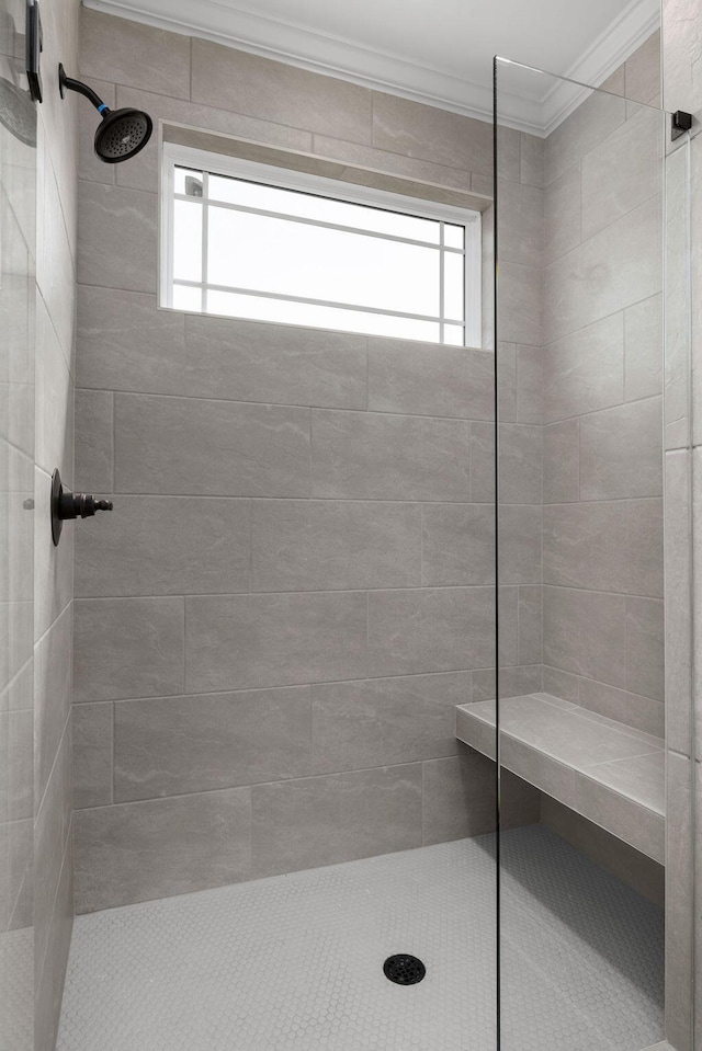 9676 Mayfly Rd # 10, Ooltewah, TN 37363 - full bathroom featuring crown molding and tiled shower