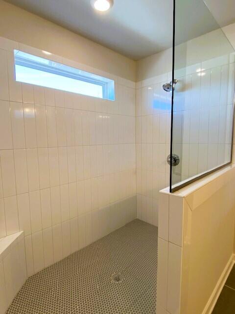 bathroom featuring walk in shower