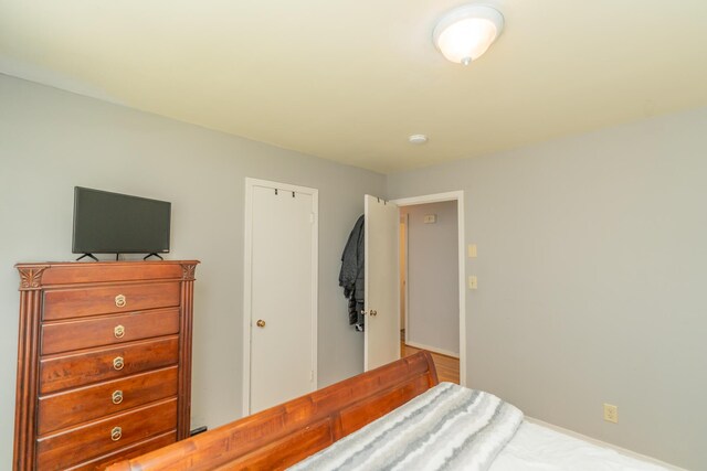 bedroom featuring baseboards