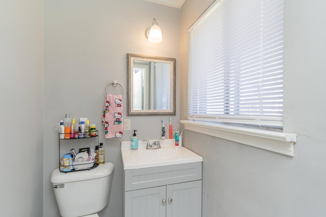 half bath with toilet and vanity