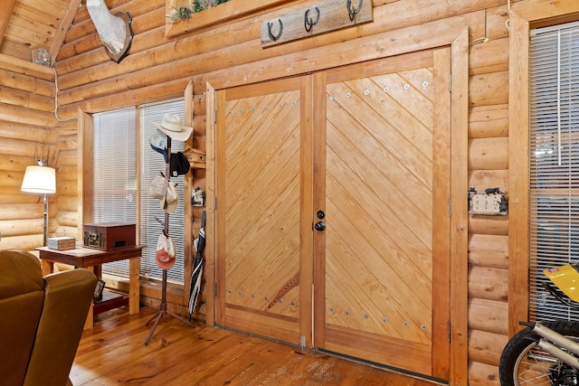 room details with log walls and wood finished floors