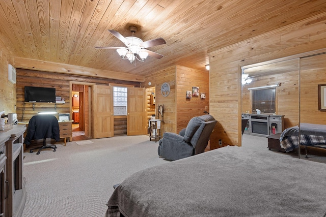 bedroom with wood walls, wooden ceiling, carpet flooring, and log walls